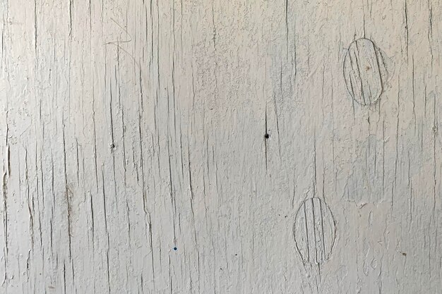 Textura de la vieja pared de madera blanca con pintura blanca agrietada