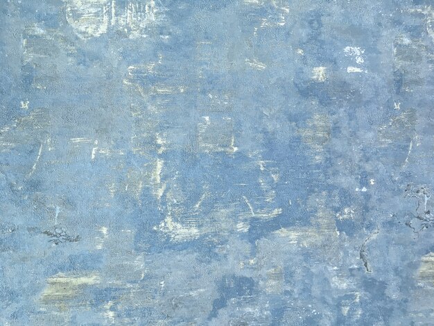 Textura de un viejo fondo de madera lamentable azul.