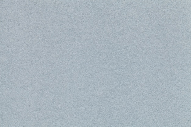 Textura del viejo primer de papel gris claro. El fondo plateado