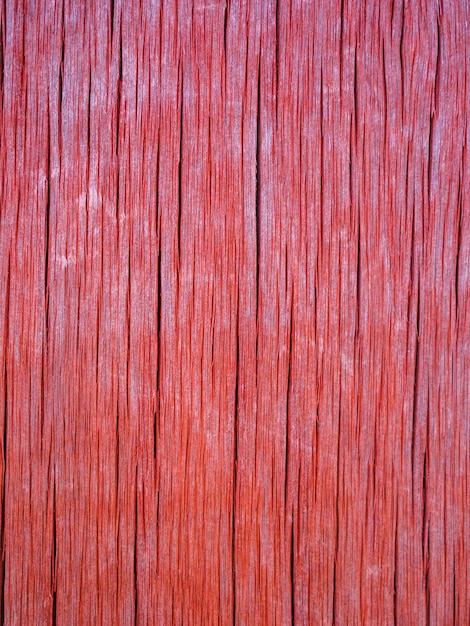 La textura del viejo tablero de madera color coral