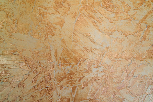 Textura de yeso amarillo. Pared áspera del edificio.