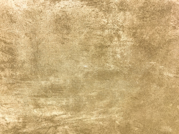 Textura de yeso beige claro decorativo imitando la vieja pared pelada