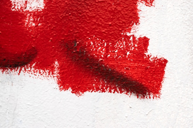 Texturwand, Tropffarbe, Kitt, rot-weiße Wand