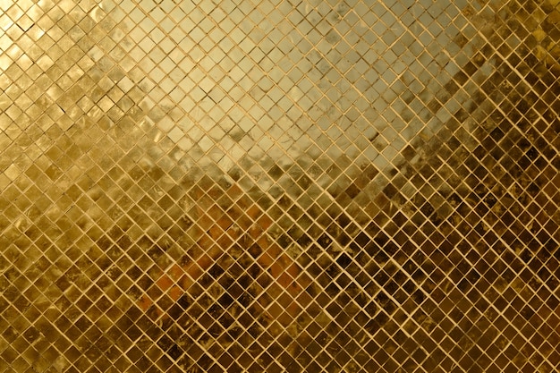 Foto texure de rico mosaico dorado de cerca