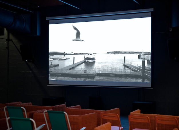 tiempo de película pantalla de proyector pantalla de interior sala de reloj