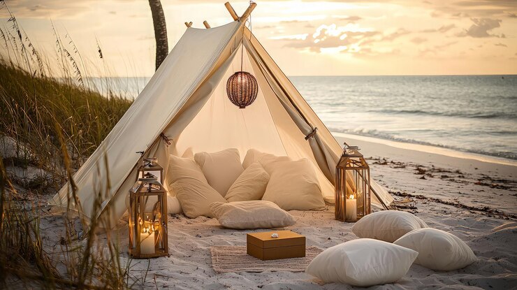 Una tienda de glamping relajante en la playa al atardecer