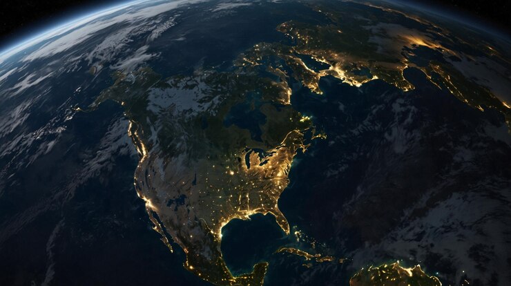 la tierra desde el espacio mostrando las luces de la ciudad y las luces