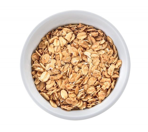 Tigela de muesli na parede branca