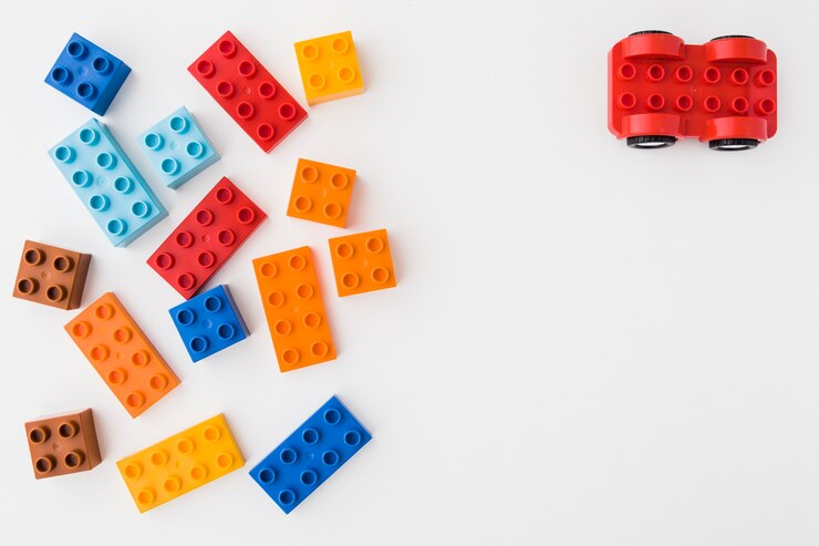 Foto tijolos de brinquedo colorido sobre fundo branco