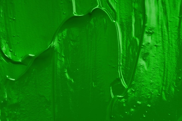 Tinta a óleo verde. fundo para designer