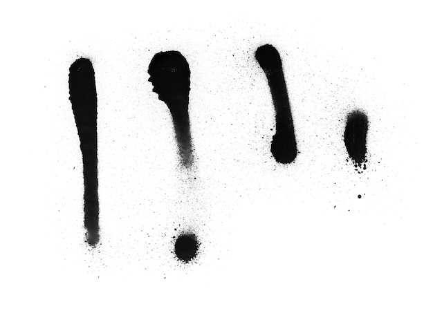 Tinta spray de cor preta em um papel de fundo branco