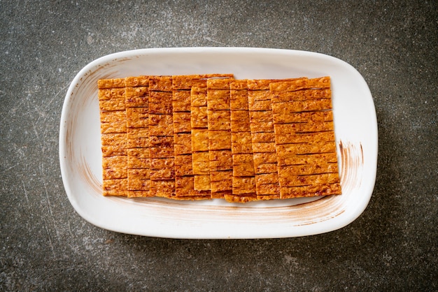 Tintenfisch-Meeresfrüchte-Snack auf Teller