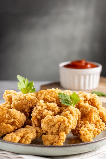 Tiras de frango empanadas Frango empanado