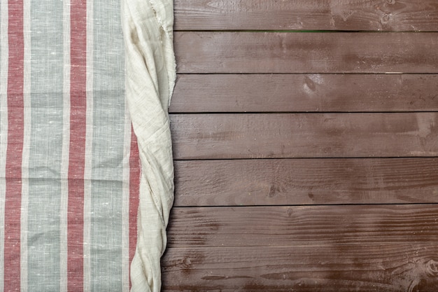 Foto toalha de mesa têxtil em madeira