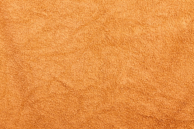 Toalla de baño naranja textura de fondo textil para diseño y decoración extreme closeup