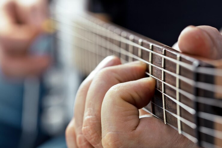 Foto tocando na guitarra elétrica