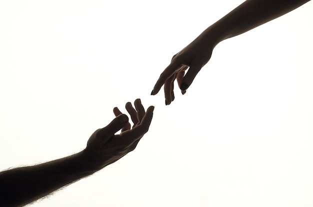 Tocar los dedos Ayudar a las manos Sostener la mano cerca Dar una mano de ayuda Rescate ayudar gesto o manos Relaciones de salvación Signo de ayuda y esperanza Ayudar brazo caridad