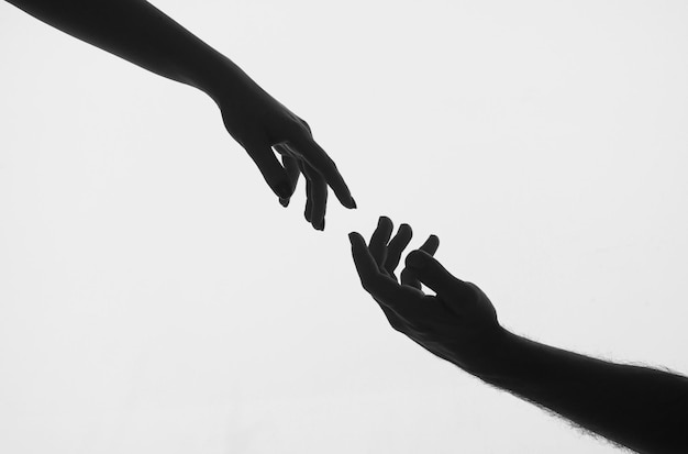 Tocar los dedos Ayudar a las manos Sostener la mano cerca Dar una mano de ayuda Rescate ayudar gesto o manos Relaciones de salvación Signo de ayuda y esperanza Ayudar brazo caridad