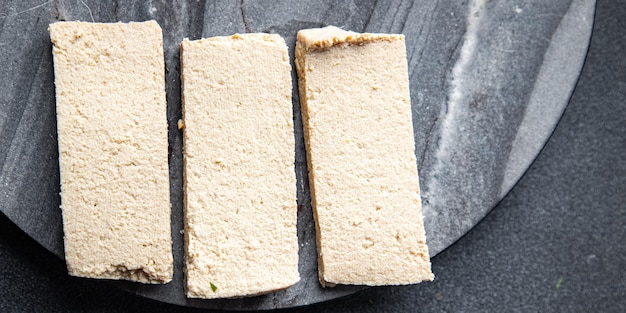 tofu producto de soya queso vegetal comida saludable comida bocadillo en la mesa espacio de copia fondo de alimentos