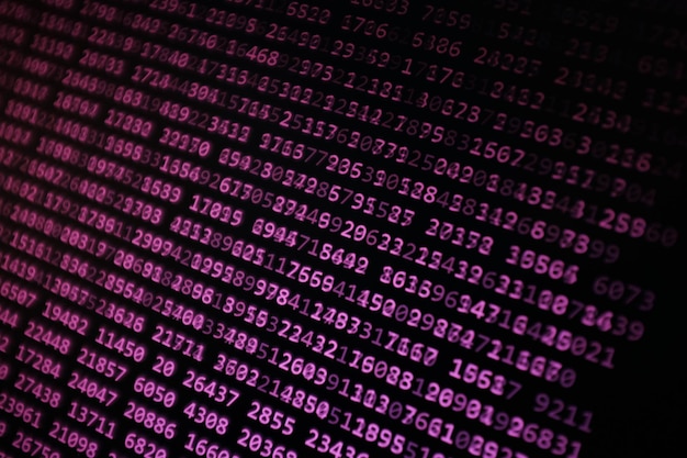 Tomada de cuadro completo de texto multicolor sobre fondo negro