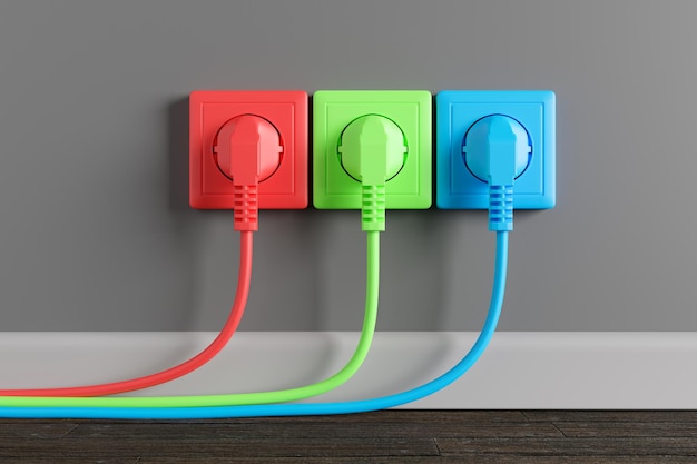 Foto tomada elétrica multicolorida na parede da sala três plugues elétricos com um cabo no soquete