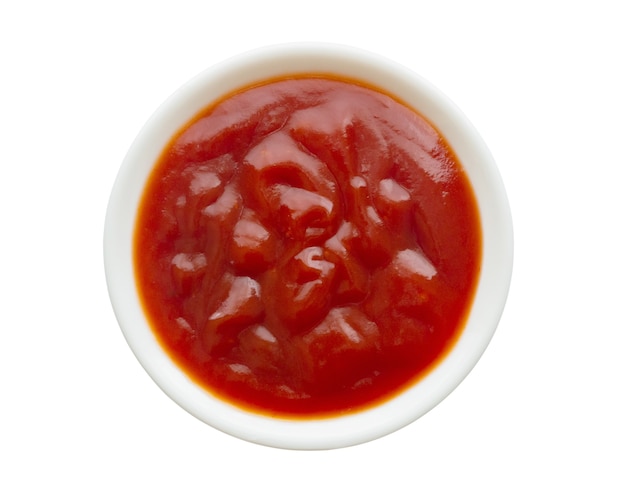 Tomatensauce Ketchup in der weißen Schüssel lokalisiert auf weißem Hintergrund