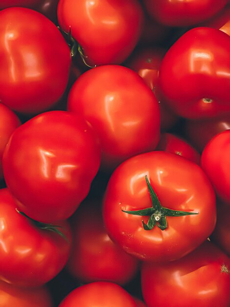 Tomates como fundo de alimentos orgânicos saudáveis vegetais frescos na dieta e agricultura do mercado de agricultores