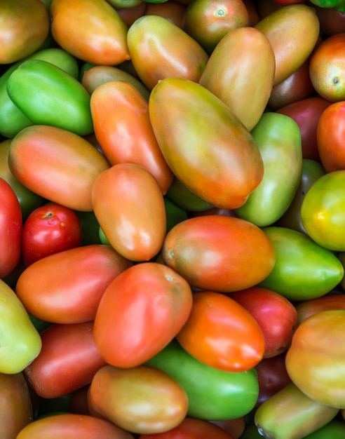 Tomates de salada no mercado ideal para plano de fundo