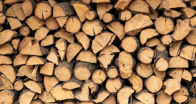 Foto toras de madeira vigas moldura de lenha tora de madeira fundo de madeira combustível colheita de lenha para o inverno textura de combustível de conceito
