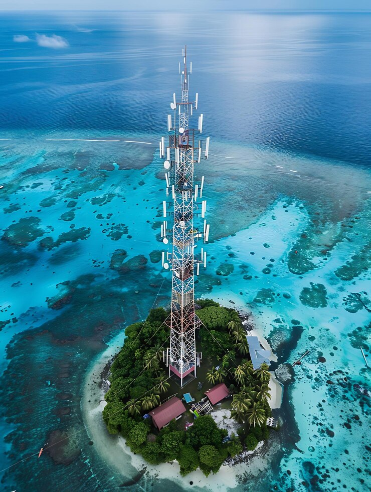torre de celulares arafed en una isla con un océano azul en el fondo