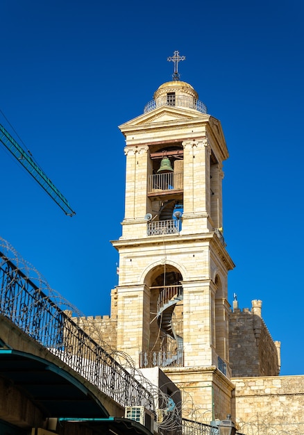 Foto torre do sino da igreja da natividade em belém, palestina