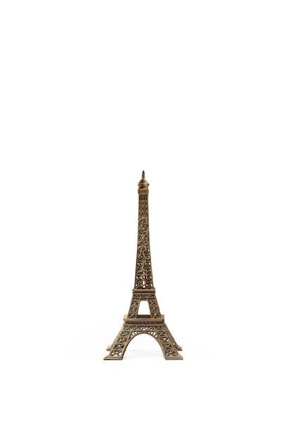 Una torre Eiffel decorativa en un fondo blanco con espacio de copia