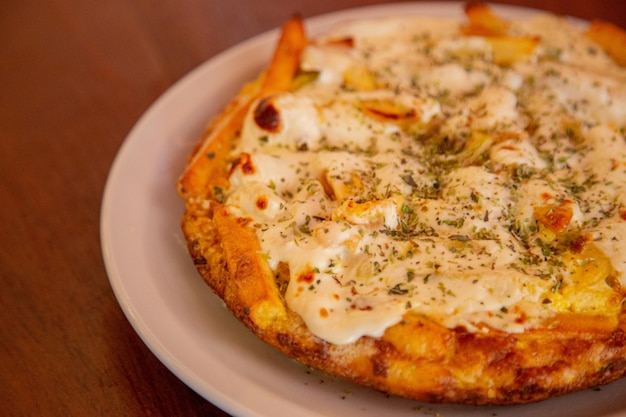 Tortilla de patatas con queso gratinado