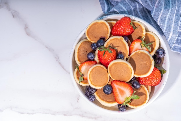 Tortitas diminutas con fresa