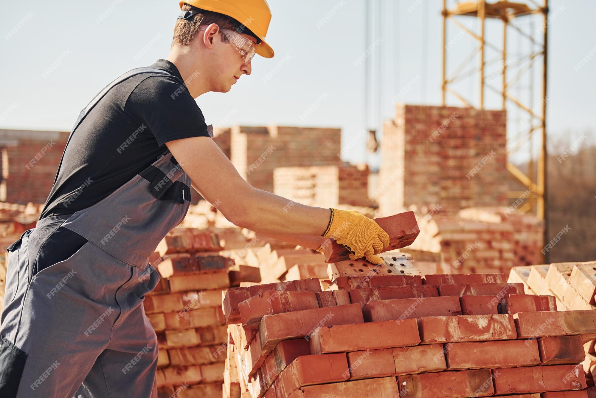 Trabalhador Construção Civil Construção Construtor Uniforme Construção  Fundo Construção Construtor fotos, imagens de © Tverdohlib.com #651182360