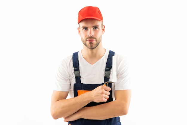 Trabalhador da construção civil masculino isolado no construtor branco em uniforme planejando renovação