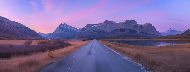 Foto el tranquilo camino del atardecer que conduce a las majestuosas montañas