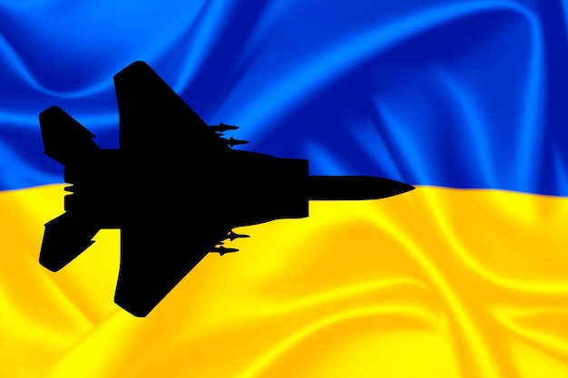 Transferência de aeronaves militares para a Ucrânia O avião contra o fundo da bandeira da Ucrânia