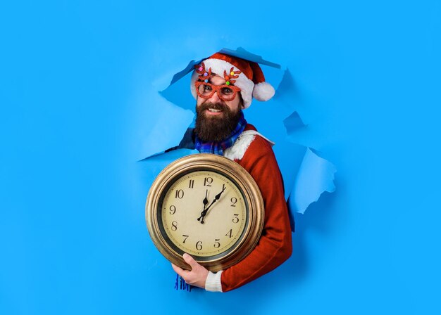 A través de papel venta de descuento ventas de navidad santa claus barbudo mantenga reloj decoraciones navideñas