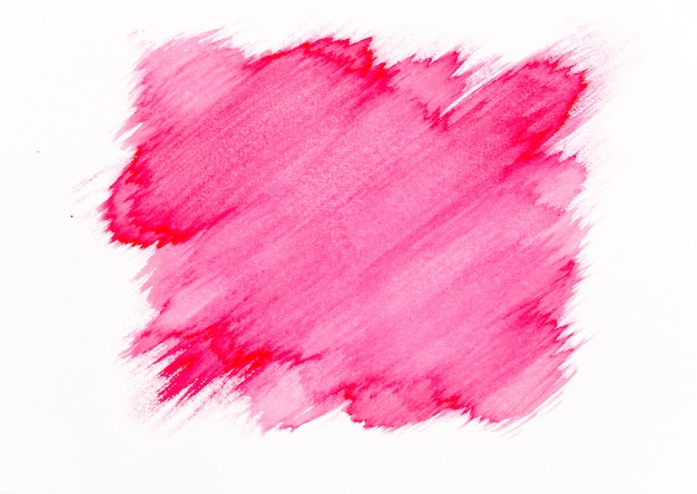 Trazo de pincel acuarela roja sobre fondo de papel blanco.