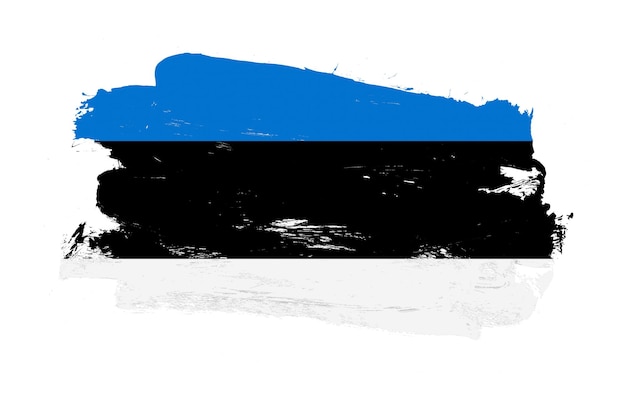 Foto trazo pincel pintado angustiado bandera de estonia sobre fondo blanco