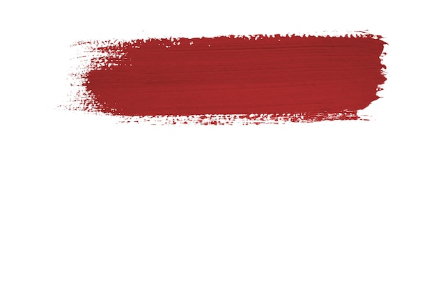 Trazo de pincel rojo aislado sobre fondo blanco