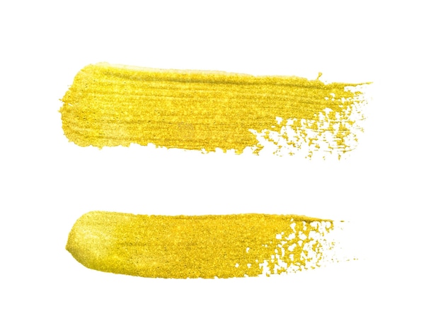 Trazos de pincel de oro amarillo