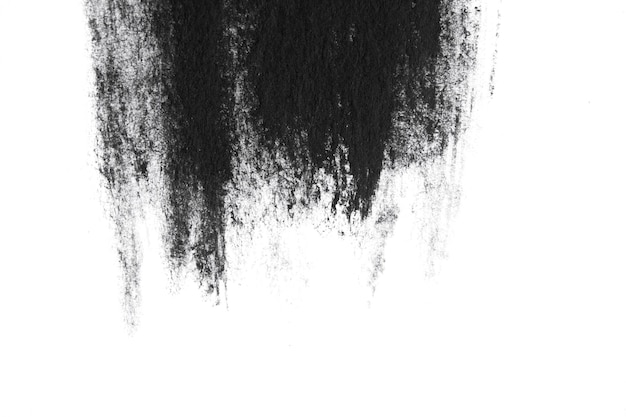 Trazos de pincel de pintura acrílica negra closeup El borde de mancha negra manchada
