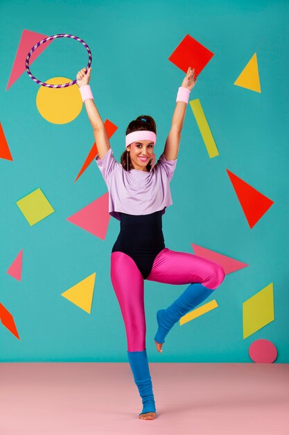 Foto treinador dos anos 80 fazendo exercícios