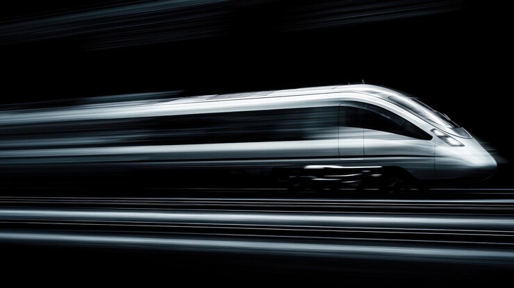 El tren expreso de pasajeros futurista en movimiento