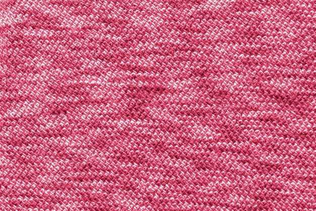 Foto trendfarbe des jahres 2023 strukturgemusterter strickstoff in der farbe viva magenta