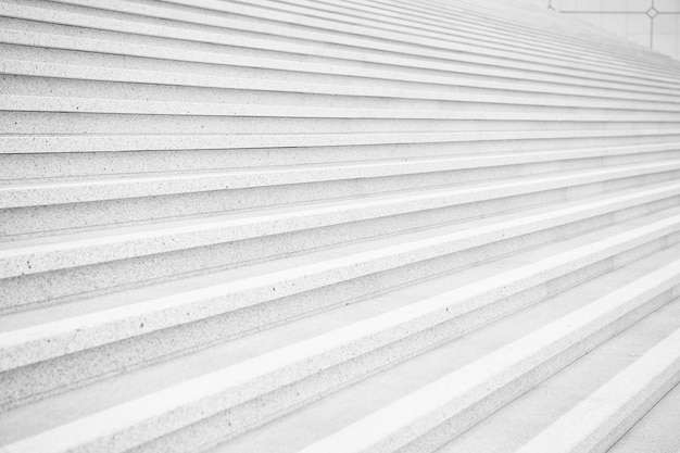 Treppen auf grauem Zementhintergrund in Paris Frankreich Symmetrie und Geometrie Traumperspektive Fortschritt und zukünftiges Erfolgskonzept