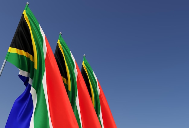 Tres banderas sudafricanas en un asta de bandera sobre un fondo azul Lugar para el texto La bandera se despliega en el viento Ciudad del Cabo Pretoria Bloemfontein Ilustración 3D