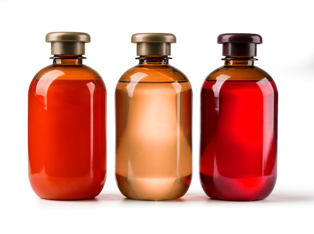 Tres botellas de cosméticos